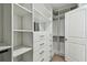 Custom closet features multiple shelves, drawers and sections for optimal organization at 2139 Stellar Brilliance Way, Lutz, FL 33558