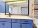 Bathroom features a vanity and a shower/tub with seashell-themed curtains at 3723 Toulouse Ct, Punta Gorda, FL 33950