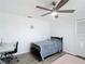 Bedroom with ceiling fan, light gray floor and natural light at 3723 Toulouse Ct, Punta Gorda, FL 33950