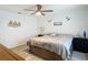 Bedroom with bed, nightstands and neutral-toned bedding at 3723 Toulouse Ct, Punta Gorda, FL 33950
