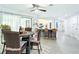 Bright dining area adjacent to the kitchen, offering ample seating and a view of the well-lit counter at 3723 Toulouse Ct, Punta Gorda, FL 33950