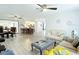 Open-concept living room showcasing a dining area and kitchen, perfect for entertaining and Gathering gatherings at 3723 Toulouse Ct, Punta Gorda, FL 33950