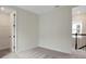 Carpeted bedroom with closet space offers a blank canvas for new owners to create their perfect space at 145 Thorne Ln, Lakewood Ranch, FL 34240