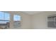 Bright bedroom with three windows and light colored walls at 164 Eagleston Ln, Lakewood Ranch, FL 34240