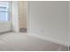 Bright bedroom with neutral carpet, white walls, and an open closet at 164 Eagleston Ln, Lakewood Ranch, FL 34240