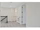 Hallway featuring neutral carpet, recessed lighting, and white doors with black hardware at 164 Eagleston Ln, Lakewood Ranch, FL 34240