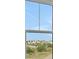 A close up view of the outside from a bedroom window with a clear blue sky at 164 Eagleston Ln, Lakewood Ranch, FL 34240