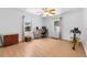 Home office with hardwood floors, desk, and ample workspace at 1701 38Th Ave, St Petersburg, FL 33713