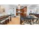 Dining area with wood floors and a view of the kitchen and living room at 1701 38Th Ave, St Petersburg, FL 33713