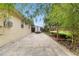 Brick paved side yard with storage for kayaks and a small trailer at 1701 38Th Ave, St Petersburg, FL 33713