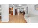 Open living room with hardwood floors and access to the kitchen at 1701 38Th Ave, St Petersburg, FL 33713