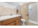 Clean bathroom with single vanity, toilet, and shower at 1701 38Th Ave, St Petersburg, FL 33713