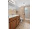 Clean bathroom with single vanity, toilet and shower at 1701 38Th Ave, St Petersburg, FL 33713