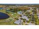 Aerial view of community amenities including pool and clubhouse at 10118 Cleghorn Dr, San Antonio, FL 33576