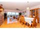 Bright dining room with hardwood floors and a view to the living room at 6475 Shorline Dr # 5303, St Petersburg, FL 33708