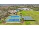 Aerial view of community tennis courts, basketball court, and pool at 4808 111Th E Ter, Parrish, FL 34219