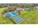 Aerial view of community tennis and basketball courts with surrounding landscape at 4808 111Th E Ter, Parrish, FL 34219