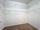Walk-in closet with wire shelving and carpeted floors, ready for organization at 4808 111Th E Ter, Parrish, FL 34219