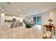 Bright and airy living room with an open floor plan and tile floors at 1511 Glen Alpine Pl, Valrico, FL 33594