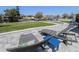 Backyard patio featuring two lounge chairs with a waterfront view at 817 Blue Heron Blvd, Ruskin, FL 33570