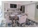 Dining room featuring a wet bar, wine fridge, and seating for six at 817 Blue Heron Blvd, Ruskin, FL 33570