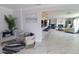 Open concept living area showcasing kitchen bar and living room space at 817 Blue Heron Blvd, Ruskin, FL 33570