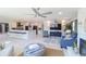 Spacious open concept living room with adjacent kitchen and dining space at 817 Blue Heron Blvd, Ruskin, FL 33570