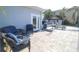 Cozy patio with comfortable seating and a charming gazebo, perfect for enjoying outdoor living and entertaining guests at 817 Blue Heron Blvd, Ruskin, FL 33570