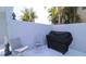 Private patio offers an outdoor space for grilling, relaxing, and enjoying the serene surroundings at 817 Blue Heron Blvd, Ruskin, FL 33570