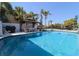 Private pool area with an outdoor gazebo and seating, surrounded by lush tropical landscaping at 817 Blue Heron Blvd, Ruskin, FL 33570