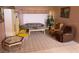Cozy living room featuring comfortable furniture and natural light at 3604 Bula Ln, North Port, FL 34287