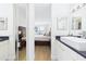 Elegant bathroom showcasing modern vanity, open bedroom view with water view at 6365 Bahia Del Mar Blvd # 210, St Petersburg, FL 33715