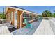 Expansive deck with a sunny spot, perfect for relaxing and entertaining at 13116 Boca Ciega Ave, Madeira Beach, FL 33708