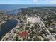 Aerial view of neighborhood near the water with city in the background at 418 40Th S Ave, St Petersburg, FL 33705