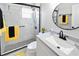 Modern bathroom features marble tile, sleek fixtures, and ample counter space at 418 40Th S Ave, St Petersburg, FL 33705