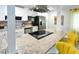 Bright kitchen boasts stainless appliances, granite counters, and white cabinets at 418 40Th S Ave, St Petersburg, FL 33705