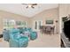 Spacious living area featuring tile flooring, high ceilings, and combined dining area at 1188 Royal Blvd, Palm Harbor, FL 34684