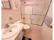 Bathroom featuring a tub with shower and a vanity with sink at 2311 Brisbane St # 29, Clearwater, FL 33763