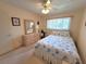 Well-lit bedroom with a large window and a view into the hallway at 2311 Brisbane St # 29, Clearwater, FL 33763