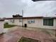 The back of the house with a patio at 6019 W Fern St, Tampa, FL 33634