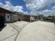 Charming single-story home with a well-maintained front yard and covered parking at 6019 W Fern St, Tampa, FL 33634