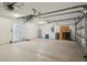 Spacious garage with water heater, water softener and utility sink at 6335 Cardinal Crest Dr, New Port Richey, FL 34655