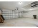 Spacious two-car garage with storage and organization potential at 6335 Cardinal Crest Dr, New Port Richey, FL 34655