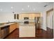 Well-lit kitchen featuring stainless steel appliances and a functional center island at 6335 Cardinal Crest Dr, New Port Richey, FL 34655