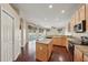 Bright open kitchen with view to the patio and pool area at 6335 Cardinal Crest Dr, New Port Richey, FL 34655