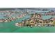 Waterfront homes nestled along winding canals in this stunning aerial view of a desirable coastal community at 1120 81St S St, St Petersburg, FL 33707