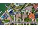 Aerial view of a residential neighborhood featuring well-maintained homes and lush landscaping at 1120 81St S St, St Petersburg, FL 33707