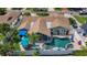Aerial view of home featuring a custom pool and patio area at 1120 81St S St, St Petersburg, FL 33707