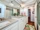 Bathroom featuring granite counters and modern lighting at 1120 81St S St, St Petersburg, FL 33707