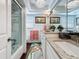 Bright bathroom with granite counters, modern lighting, and decorative rug at 1120 81St S St, St Petersburg, FL 33707